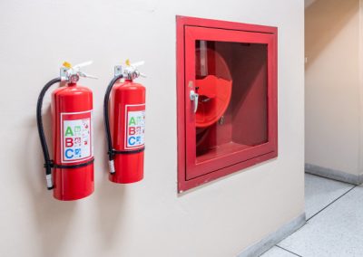 fire-extinguisher-system-wall-background-powerful-emergency-equipment-industrial_42256-1247